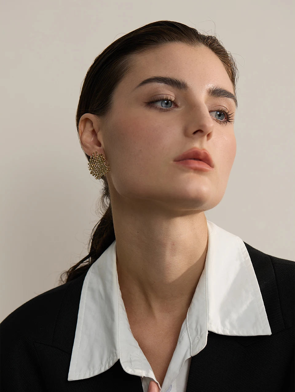 Golden Woven Harmony Stud Earrings