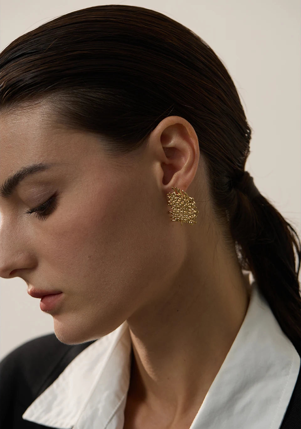 Golden Woven Harmony Stud Earrings